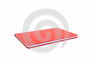 Close up red leather notebook on white background