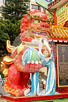 Close up red lion statue in Tin Hau Temple Repulse Bay in Hon