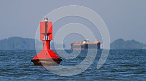 Close up of a red navigational buoy
