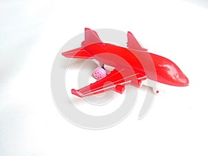 Close up of red plane toy isolated white background