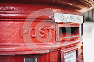 Close up of a red post box in London, UK.