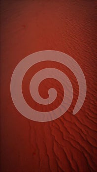 Close up of red sand texture background illustration with ripples