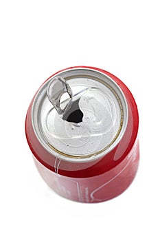 Close Up of a Red Soda Can with Pull Tab open with condensation With Copy Space Isolated on White Background.
