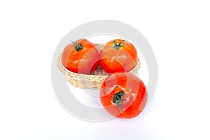 Close up red tomatoes isolated on white background.Tomato with droplets of water.Fresh tomatoes ready to cook.Tomatoes are vegetab