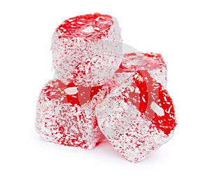 Close up of red Turkish Delight sweets isolated on white