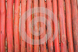 Close up of red wooden background texture, free space for design text or pictures