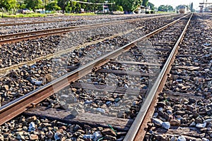 Close up of redirection old train or railroad tracks with wooden backing In the countryside