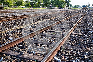 Close up of redirection old train or railroad tracks with wooden backing In the countryside photo