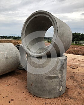 Close up of reinforced concrete pipes at construction site