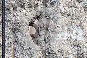 Close up of the remains of the Berlin Wall, Germany at the Wall Memorial, reminder of a once divided city.