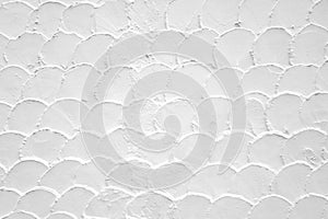 close-up repeating waves striped of white concrete wall textured background
