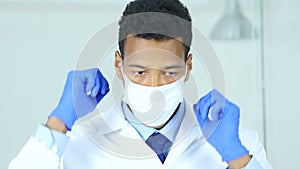 Close up of reseach scientist, doctor in mask