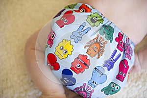 Close up of a reusable all in one nappy