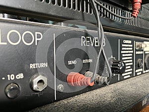 Close up reverb channel on amplifier. photo