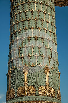 Close-up of rich decoration in green and gold of lamp at the Place de la Concorde in Paris.