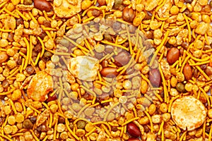 Close-up of Rich and Spicy Navratan Indian namkeen (snacks) Full-Frame Background.