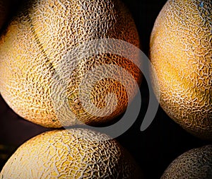 A close up a ripe cantaloupes.