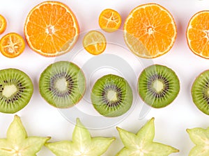 Close-up of a ripe exotic slices of fruits isolated on a white background.