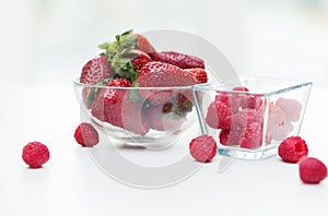 Close up of ripe red strawberries and raspberries