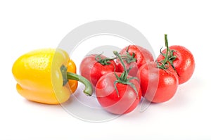 Close up of ripe tomatoes and yellow pepper