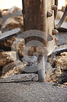 Close Up Of Road Being Dug Up For Repair