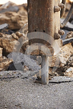 Close Up Of Road Being Dug Up For Repair