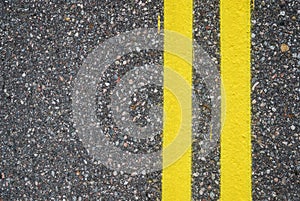 Close-up of road surfacing with lane lines