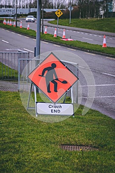 Close up of a road work warning road sign