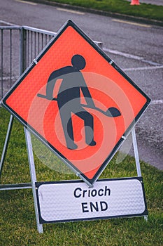 Close up of a road work warning road sign