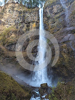 Close-up of the roaring Multnomah Falls from the Multnomah Creek Bridge on a February day