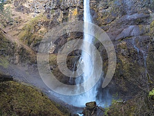 Close-up of the roaring Multnomah Falls from the Multnomah Creek Bridge on a February day