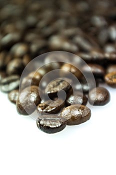 Close Up of Roasted Coffee Beans Isolated on White Background