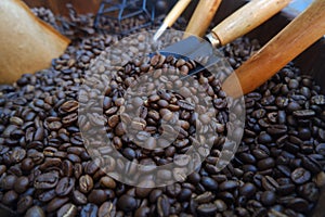 Close-up roasted coffee beans with shovel image-picture.