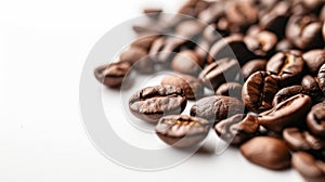 Close-up of Roasted Coffee Beans on white Background with Copy Space for Caffeine Drink Concept