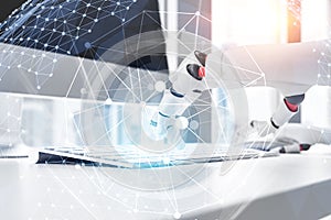 Close up of robot hands typing, internet