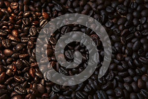 Close up robusta coffee bean roasted in old tradition style photo