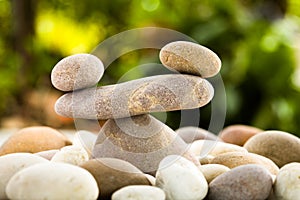 Zen stacked stones on nature background