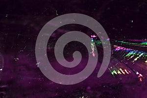 Close Up of a Rock Crystal with inclusions in Putple blue Rainbow