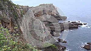 Close-up of rocks. sea waves breaking on the rocks