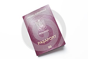 Close-up of Romanian passport isolated on white background.