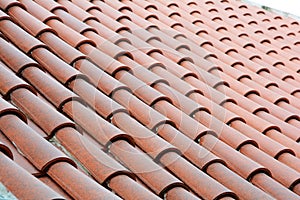 Close up on roof construction with ceramic tiles