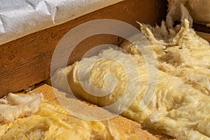 Close-up of roof rafters and stone wool insulation