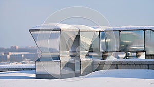 Snow-covered rooftop HVAC system â AI content