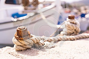 Close up of a rope knot holding moored boat