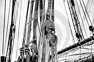 Close up of the ropes, lines, masts and sails of a tall ship