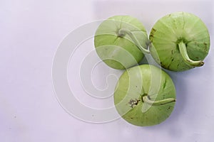 Close up of round green bottle gourds