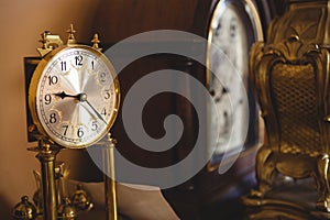 Close-up of round watch on table