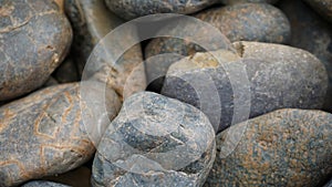 Close up rounded gray gravel texture, River Stone Background