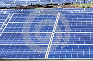 Close up rows array of polycrystalline silicon solar cells or photovoltaic cells in solar power plant station