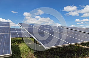 Close up rows array of polycrystalline silicon solar cells or photovoltaics in solar power plant